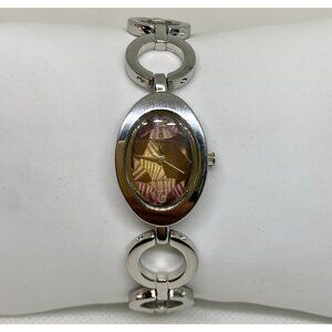 Minicci silver tone women watch 20mm oval case quartz analog up to 8” running